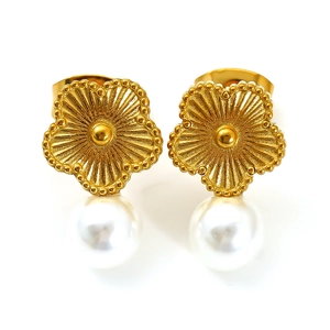 Exquisite gold floral stud earrings with white pearls and detailed petal textures