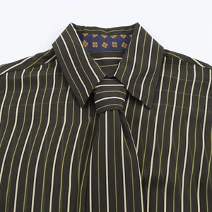 Vertical striped shirt with matching tie and silk finish shown in flat lay view