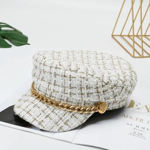 White tweed newsboy hat with gold chain detail and metallic buttons for women