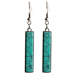 Rectangle turquoise earrings with silver frames and fishhook ear wires on white backdrop
