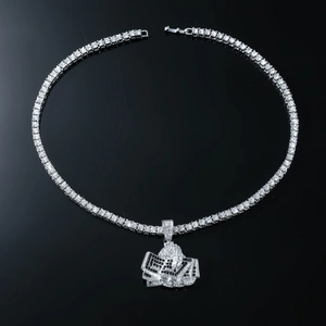 Macro view of silver hip-hop necklace with money roll pendant and sparkling tennis chain