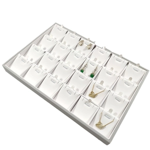 24-compartment jewelry display tray with grey frame and white inserts for necklaces