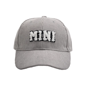 Detail of light gray corduroy baseball cap with white plush MINI letter embroidery