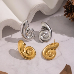 Polished spiral seashell stud earrings in gold and silver finish with metallic gloss