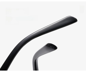 Detailed macro view of curved temples on black resin sunglasses for comfort fit