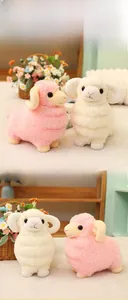 Close-up of soft plush lamb toy showing fluffy texture and cute curled horns detail
