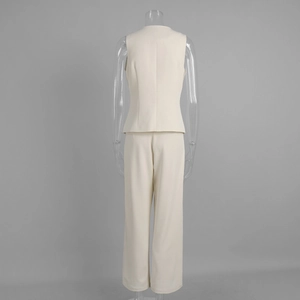 Rear view detail of beige sleeveless vest and wide leg trousers set in smooth fabric