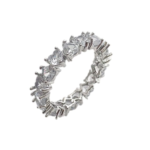 Detailed macro shot of eternity ring featuring heart cut stones in claw setting