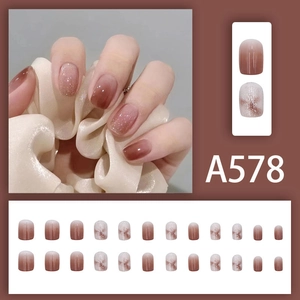 Detail of A578 gradient brown press-on nails with silver glitter and 24-piece set layout