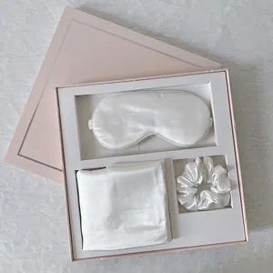 Silk sleep set with eye mask, pillowcase, and scrunchie in an elegant pink gift box