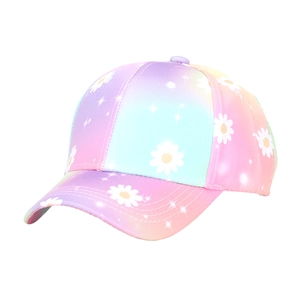 Close-up of tie-dye baseball cap with colorful floral daisy print and curved brim