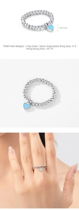 Detail of silver S925 beaded ring with blue heart charm showing size and weight specs