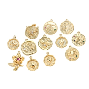 Vintage gold-plated jewelry pendants with zirconia stones in various floral and heart shapes