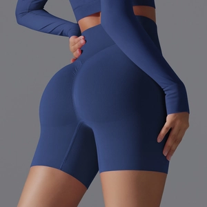 Close-up of seamless scrunch butt yoga shorts in dark blue with high waist support