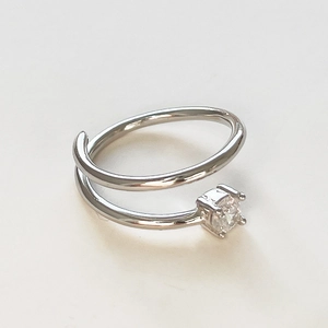 Handcrafted S925 sterling silver spiral ring with square-cut zircon stone on white background
