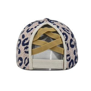 Detail of cross elastic bands on thick leopard baseball cap for high ponytail