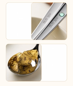 Detailed macro view of 304 stainless steel soup spoon with mirror finish and SUS 304 engraving