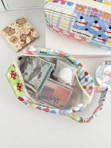 Quilted patchwork cosmetic bag with cute cartoon prints for stationery and makeup storage