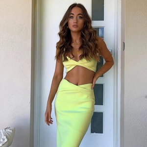 Chic two-piece lemon yellow crop top and midi skirt set for summer fashion