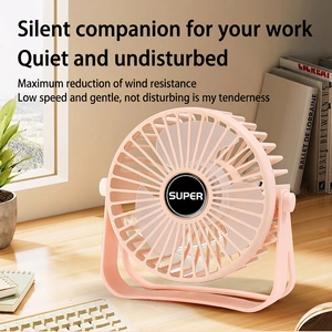 Portable pink desktop USB fan with adjustable U-shaped stand in a bright office setup