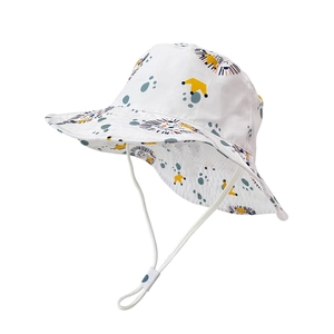 Detail of kids sun hat with cartoon lion and crown prints featuring adjustable chin strap