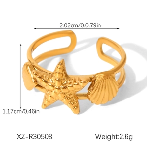 Detail view of 18K gold starfish and seashell ring with dimensions and weight data