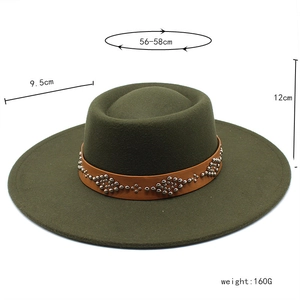 Olive green felt fedora featuring a brown leather band with silver rivet studs details