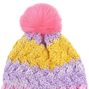 Close-up of kids' winter knit hat with large pink pompom and yellow lavender gradient texture