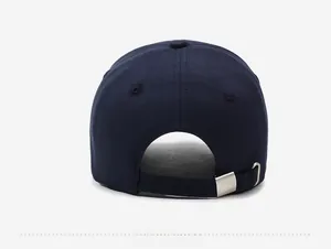 Detail view of navy blue baseball cap back with adjustable strap and metal buckle