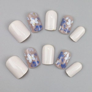 Short round blue floral press-on nails with cream white glossy finish 24pcs set