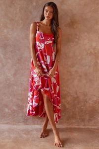Full view of a floral boho maxi dress with red abstract print for summer vacation