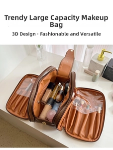 Detail view of large capacity cosmetic bag interior with makeup brush slots and compartments