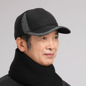 Detail view of men's winter baseball cap and matching scarf with knit texture