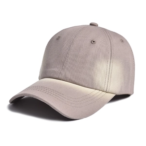 Detailed close-up of a tie-dye baseball cap featuring neat stitching and breathable eyelets