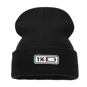 Unisex black knit beanie featuring a 1% battery percentage patch on the fold-up cuff
