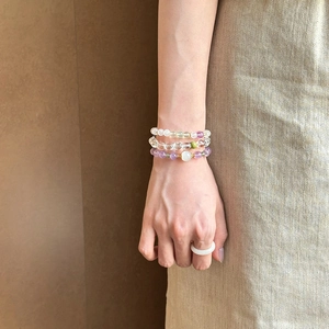 Elegant natural amethyst and green stone beaded bracelets with a minimalist white ring