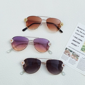 Kids daisy flower aviator sunglasses with metal frames in tea, purple, and grey lenses