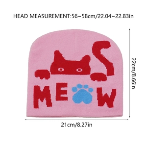 Pink knit beanie showing cat jacquard pattern and MEOW lettering with dimensions