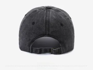 Detail view of the washed cotton baseball cap with adjustable metal buckle on back