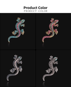 Detailed grid view showing crystal lizard brooches in various color options and finishes