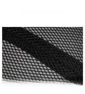 Close-up detail of breathable black mesh fabric and reinforced stitching on a beret hat