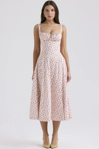 Close-up of floral slip dress featuring a drawstring neckline and cinched waist design
