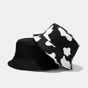Bob réversible tendance avec motif vache noir et blanc pour hommes et femmes