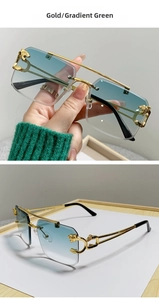 Detail of rimless rectangle sunglasses with golden panther motif and green gradient lenses