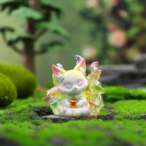 Macro detail of translucent lucky fox figurine with iridescent gradient and floral accents