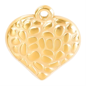 Macro shot of gold stainless steel heart pendant with hammered texture and integrated loop