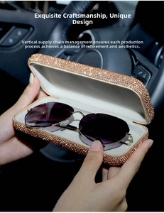 Close-up of champagne gold rhinestone glasses case with purple gradient aviator sunglasses