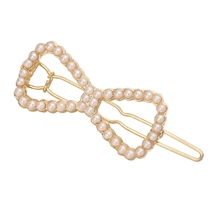 Elegant gold alloy heart-shaped openwork hair clip with inlaid white pearls for women