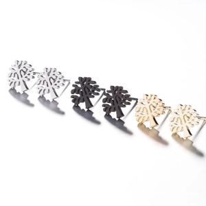 Three pairs of Tree of Life stud earrings in silver, black, and gold stainless steel