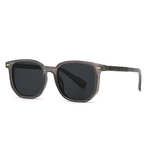 Classic pilot square sunglasses with translucent grey frame and gold arrow metal accents